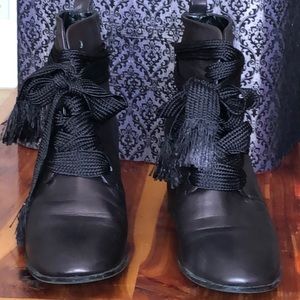 Tie up purple leather German made Booties.